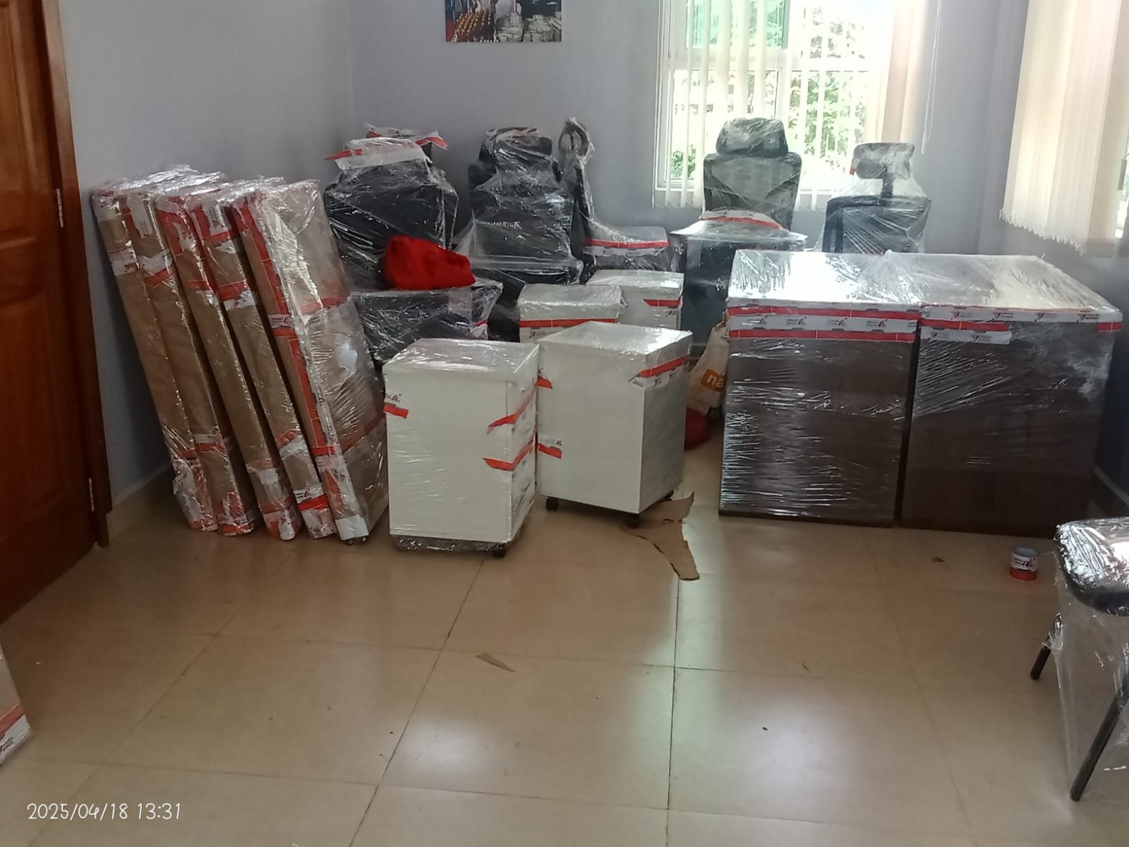 Furniture carefully wrapped and prepared for a protected move by Joham Movers